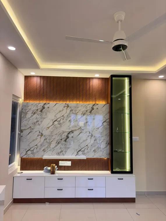 Living room feature wall in marble and walnut