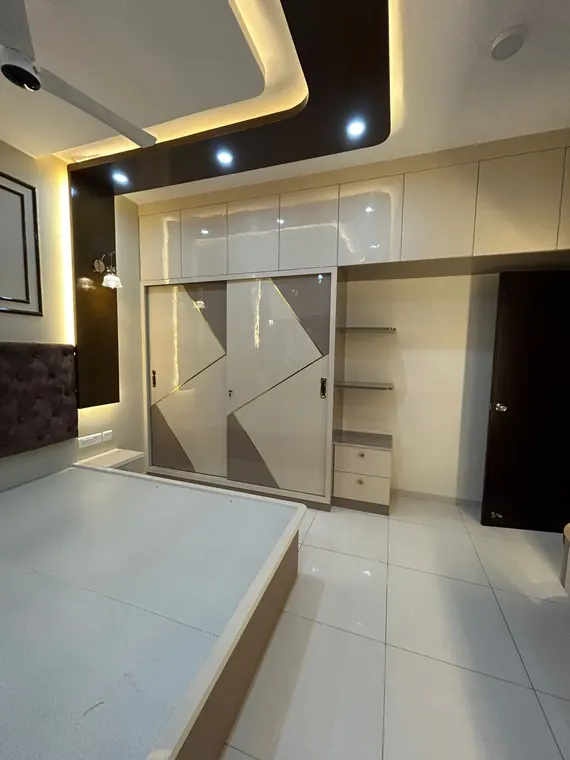 Sliding wardrobe with a matching platform bed